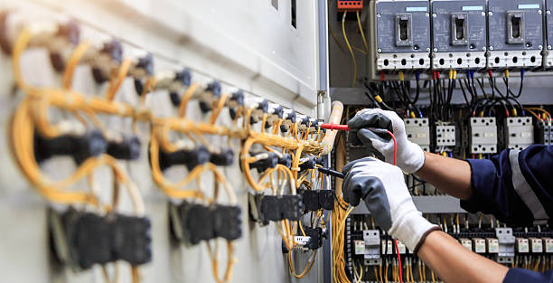 Professional Emergency Electrician technician working in Harmon County County, OK